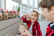 © lithiumphoto - Children opening Christmas handmade advent calendar box