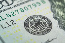Stamp On A Dollar Banknote With An Eagle And The Words United States Federal Reserve System