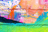 Fototapeta Młodzieżowe - A fragment of colorful graffiti painted on a brick wall. Abstract backdrop for design.