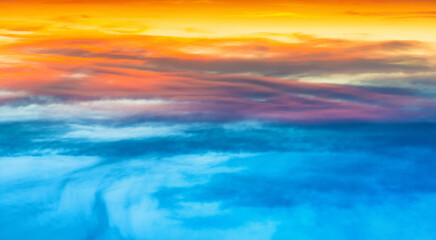 Wall Mural - panorama of sunset dramatic sky with colorful clouds as nature sunset background