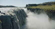 Iceland Beautiful And Powerful Wasserfall Dettifoss. The Most Powerful Waterfall In Europe
