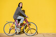 © Raul Mellado - happy girl smiles riding her retro pink bike