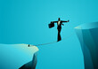 © rudall30 - Businessman walking on rope