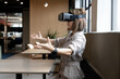 © wavebreak3 - Asian businesswoman wearing virtual reality headset in creative office