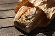 © MATTHEW - Sourdough seed bread on a wooden table top.