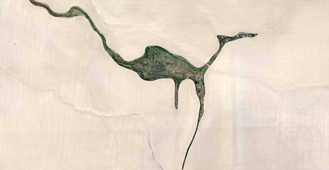 the escape, abstract photograph of relief drawings in farm fields in the u.s.a. from the air,