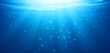 © klyaksun - Underwater background, water surface, ocean, sea, swimming pool transparent aqua texture with air bubbles, ripples and sun rays falling, template for advertising. Realistic 3d vector illustration