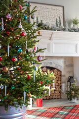 Live Christmas tree with vintage decorations in the living room