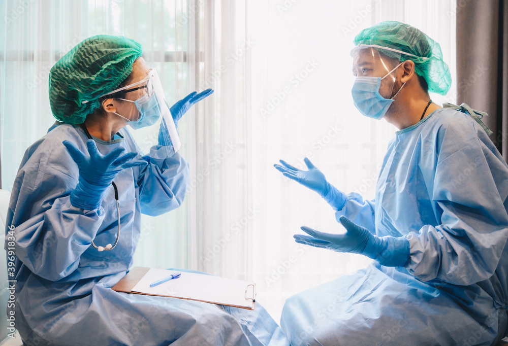 Nurse and Doctor arguing about about medical treatment in hospital ...