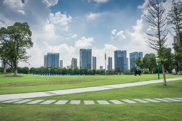 Canvas Print - Modern building behind the lawn