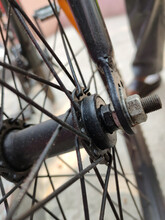 Details Of The Center Of The Bicycle Wheel. Skewers, Fork And Nut In Shallow Focus