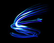 Colorful Neon light painting effect. Abstract luminous swirl tail Lights shape at motion on isolated with black background.