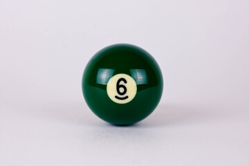 Wall Mural - Shiny green ball number 6 for billiard isolated on white background