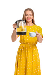 Poster - Happy woman with electric kettle on white background