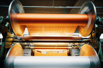 textile factory machine weaving close up