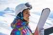 © ZoomTeam - woman skier  wearing white healmet with mask in snow winter mountain