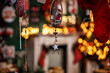 Colorful Christmas decor at the Maastricht Christmas Market. Gifts, fir tree branches, decorations and blurred glow of garlands. Christmas, winter, new year concept.