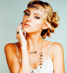 Poster - young blond woman dressed like ancient greek godess, gold jewelry close up isolated, summer trends