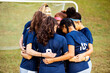 © B. Alyssa Trofort/Creative Flame - Female team huddled together before game