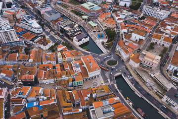 drone shot aerial view from above look Aveiro Portugal cloudy day city center rooftops orange red Monumento ao Marnoto e à Salineira
christmas tree