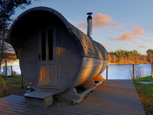 Sauna In A Wooden Barrel On The Lake Shore. Relax Holidays.