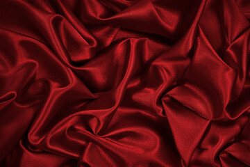 Wall Mural - Red silk satin. Red shiny fabric background. Luxurious bright background.