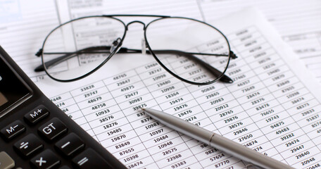 Poster - Financial graphs and charts analysis with calculator, pen and glasses
