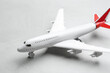 © New Africa - Toy airplane on grey stone background, closeup