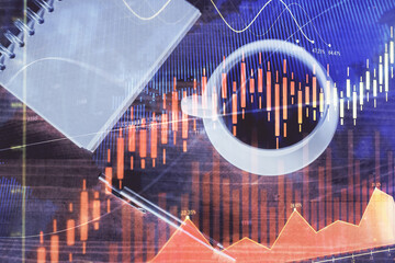 Double exposure of forex graph drawing and work table top veiw. Concept of financial analysis.