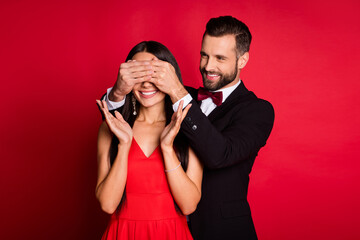 Sticker - Photo of nice couple man close girl eyes wear suit dress isolated on red color background