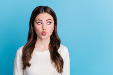 Sticker - Photo of charming tricky wavy lady wear white sweater looking empty space isolated blue color background