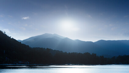 Wall Mural - Beautiful sunrise at sea and mountain background. Koh Chang, Trat, Thailand, Asia