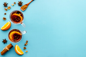 Christmas mulled wine with spices and oranges - winter hot drink