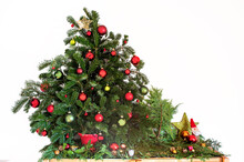 Seasonal Decoration With Christmas Baubles Red And Green, Fir Branches And Santa Dwarf.