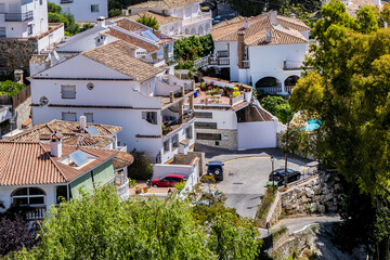 Wall Mural - Beautiful aerial view of Mijas - Spanish hill town overlooking the Costa del Sol, not far from Malaga. Mijas known for its white-washed buildings. Mijas, Andalusia, Spain.