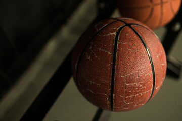 Close-up of two basketballs on a rack in a gym. sports and sports games concept