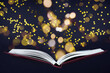 Open book, star shape confetti, bokeh on blue black background. Magic, knowledge, fairy tale concept. Top view, flat lay, copy space