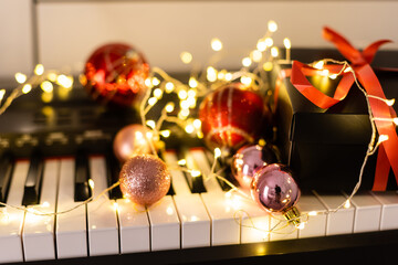 Canvas Print - Piano keys with Christmas decorations, closeup