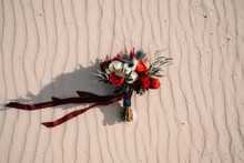 Flower Bouquet On Sand