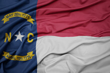 Waving Colorful Flag Of North Carolina State.