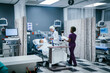 © FS Productions/Blend Images - Doctor and nurse with patient in hospital