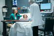 © FS Productions/Blend Images - Caucasian doctor talking to mother and daughter in hospital