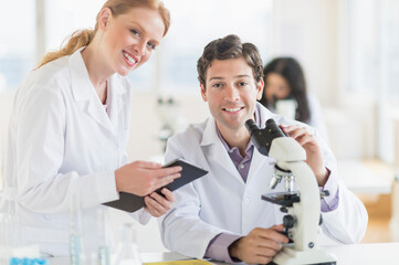 Scientists working in laboratory