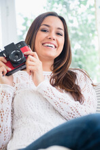 Woman Taking Pictures With Camera