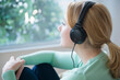 © JGI/Jamie Grill/Blend Images - Caucasian woman listening to headphones