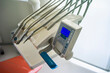 © Alberto Guglielmi/Blend Images - Close up of equipment in office of dentist
