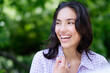 © JGI/Tom Grill/Blend Images - Hispanic woman laughing outdoors