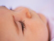 © Daniel Grill/Tetra Images - Close- up of baby boy (6-11 months)