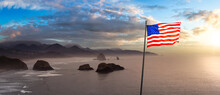 American National Flag Overlay. Cannon Beach, Oregon, United States. Beautiful Aerial Panoramic View Of The Rocky Pacific Ocean Coast. Dramatic Colorful Sunset Sky.