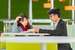© shine - Education, Tutoring, Business and Encouragement Concept – Asian university student working one to one with tutor.